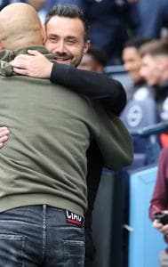 Pep Guardiola & Roberto de Zerbi embrace each other