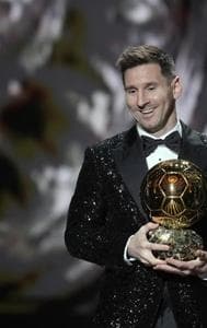 Lionel Messi with the Ballon d’Or