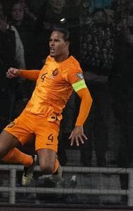 Virgil van Dijk scored an injury time penalty as the Netherlands secured a crucial win over Greece