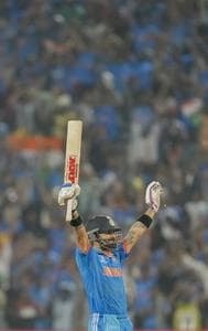 Virat Kohli celebrates after scoring his ODI ton as India win over Bangladesh