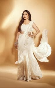 Madhuri Dixit Owns Monochrome In Shimmery White Saree